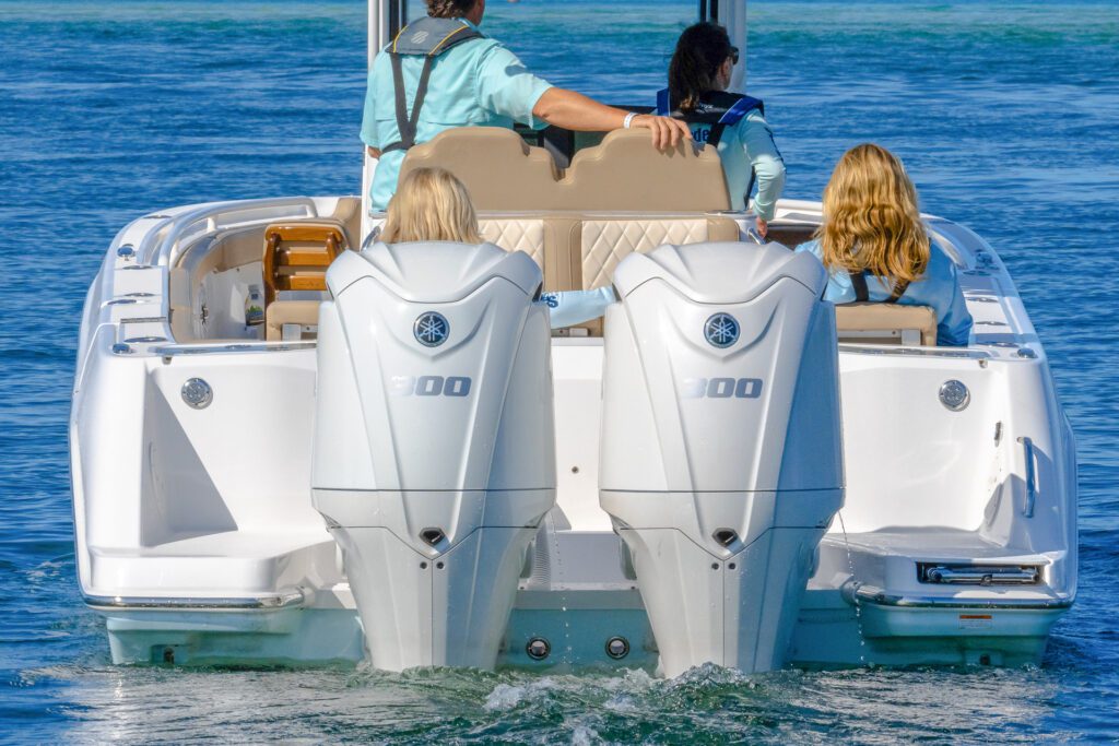 840 People riding in the center console everglades boat with two strong motors