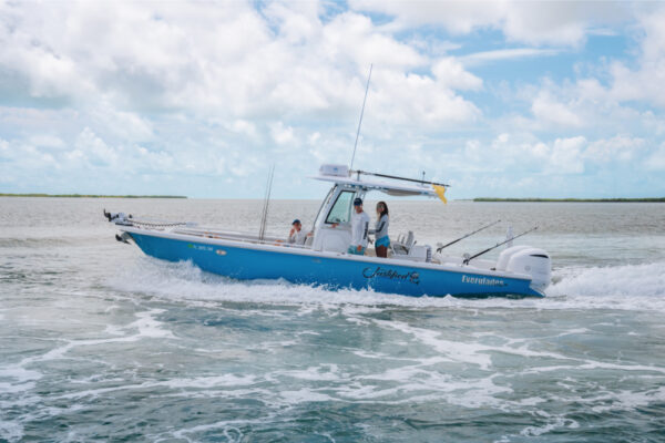 Three people on an Everglades boat