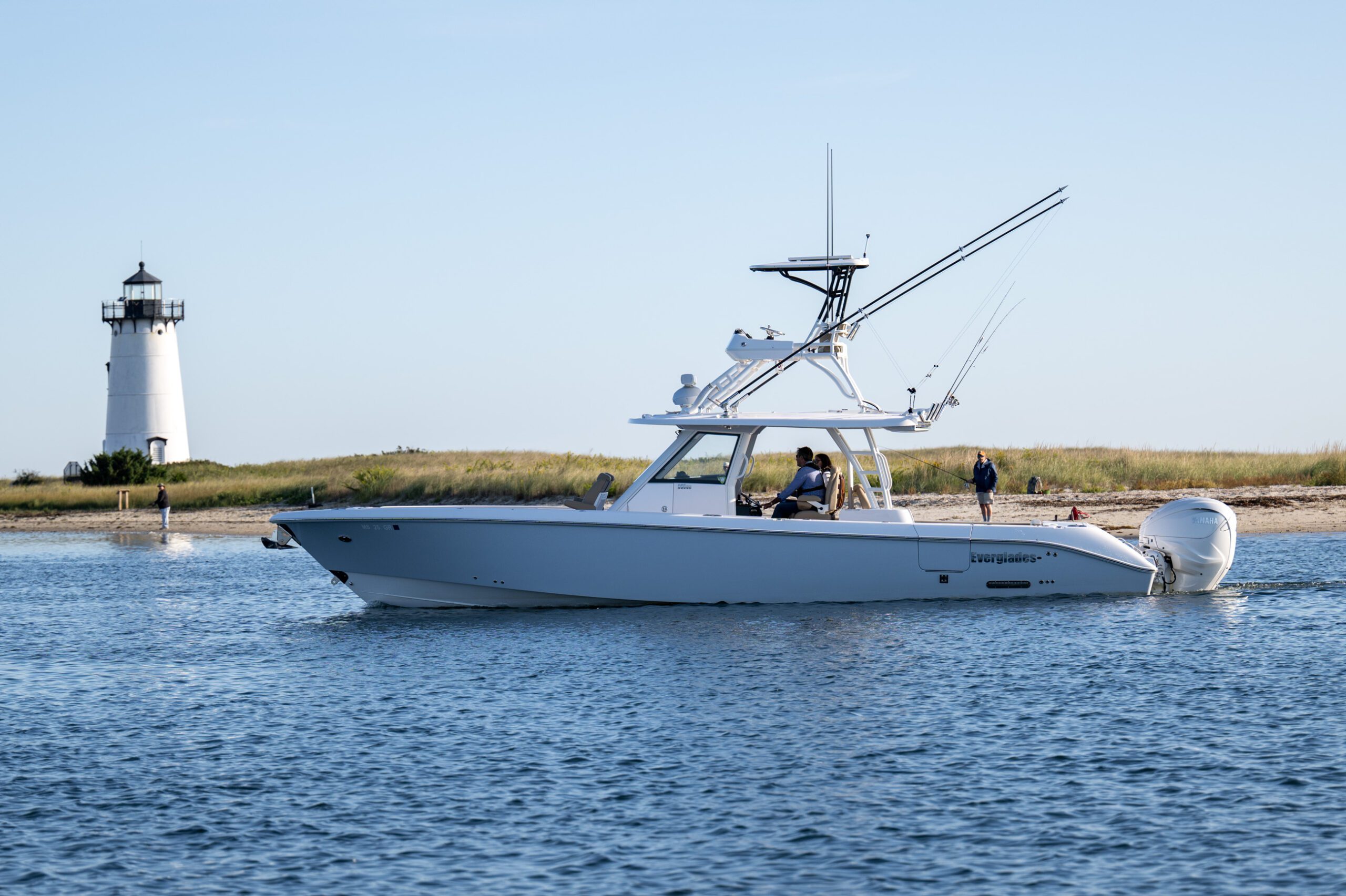 39-foot center console boat in the water in front of a lighthouse at Martha's Vineyard